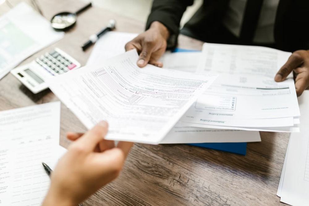 A person handing out documents