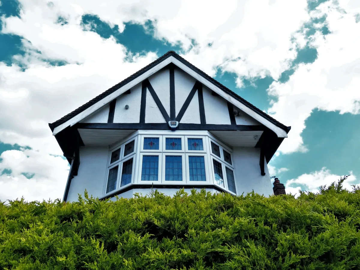 Low angle photo of house during the daytime.