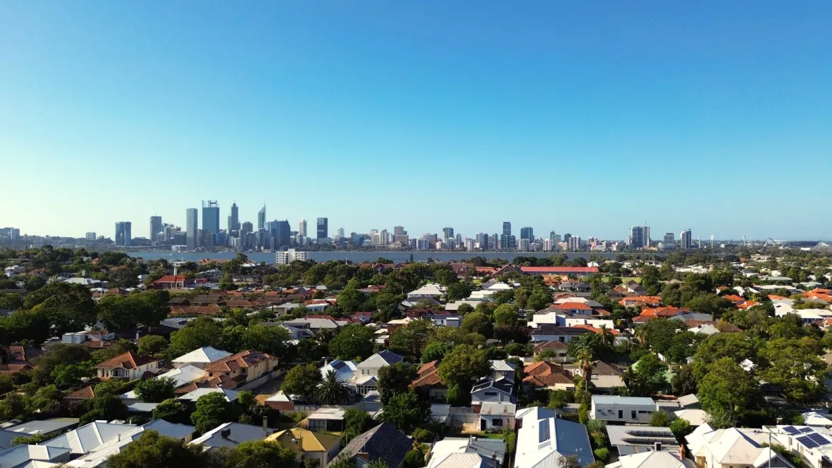 Aerial view of Perth city skyline and suburbs.